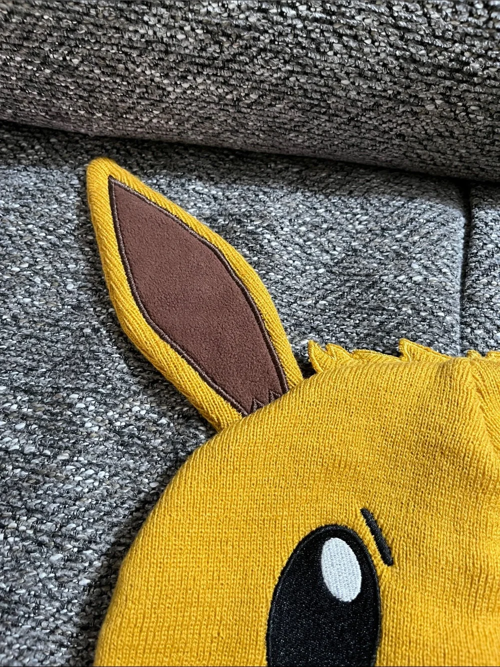 Pokemon Winking Eevee with Ears Beanie Hat with Pom-Pom Tassels
